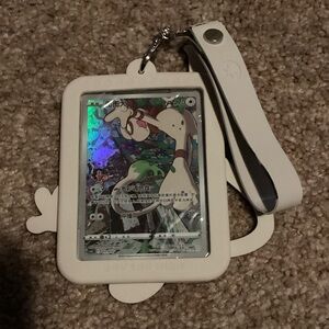 Pokémon Sméargel keychain. Card inside a card holder made into keychain & strap